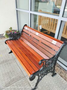 Bench by flowers
